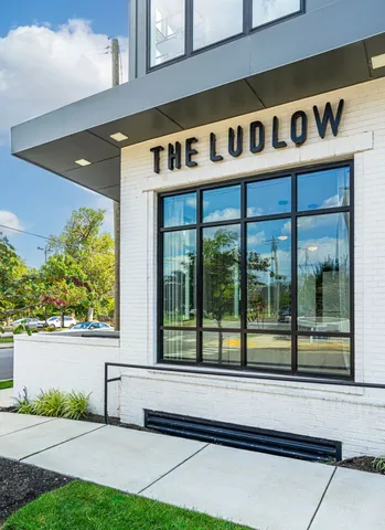 a view of a room with wooden floor and closet