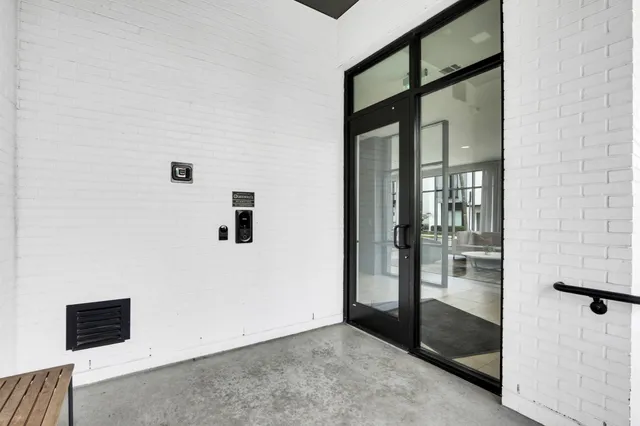 a kitchen with stainless steel appliances a stove a sink a microwave and cabinets