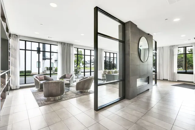 a large white kitchen with a lot of counter space