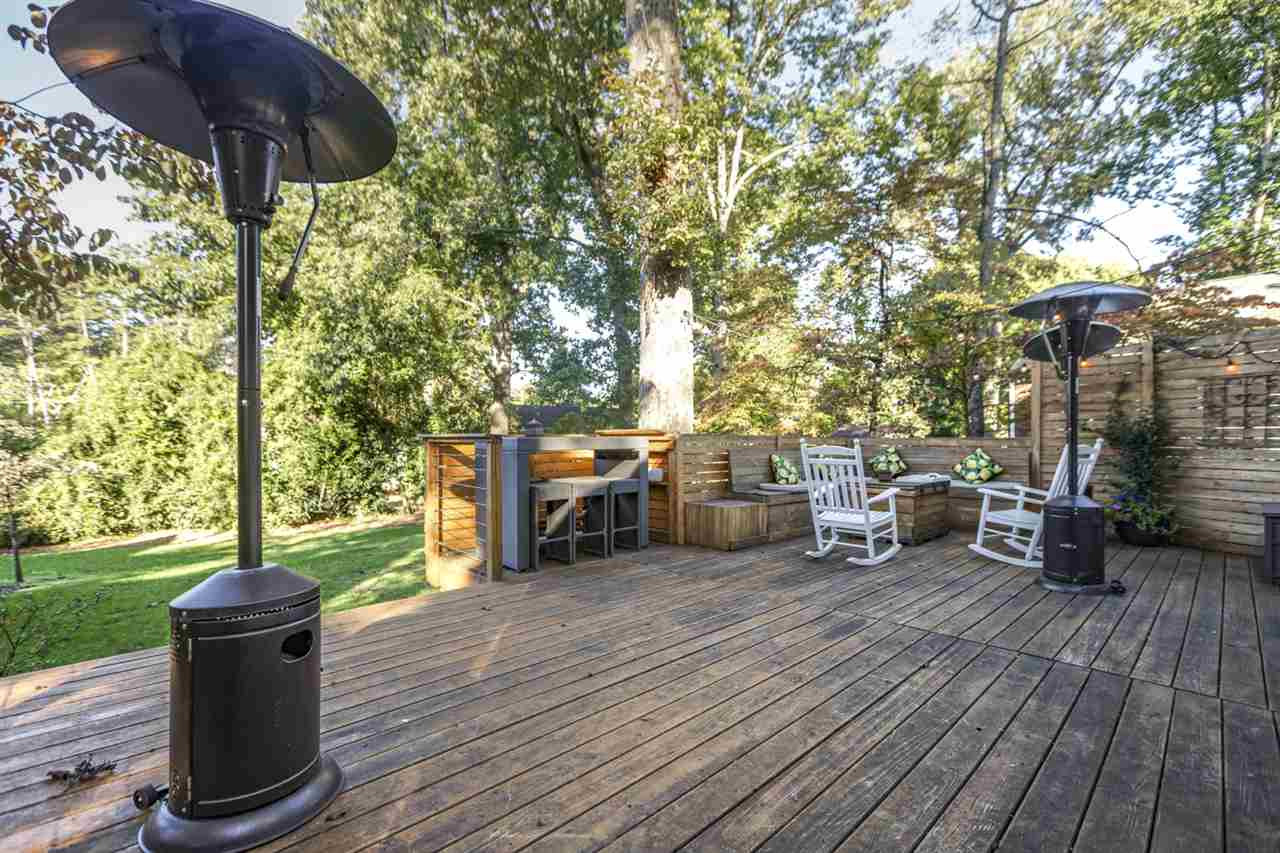 413 Dixie Trail Raleigh, NC 27607 - Photo 26 of 30 Enjoy outdoors with friends and family! Huge deck with built in storage benches & Cable railing Deck