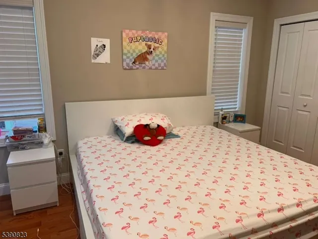 a bedroom with a bed and a cabinets