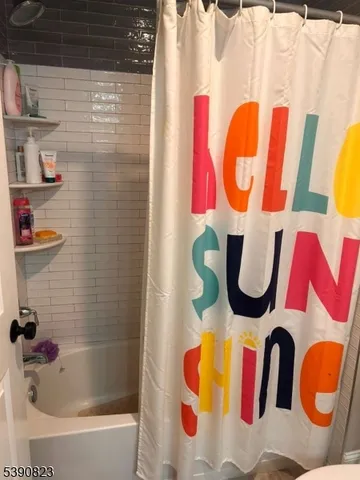 a bathroom with a sink and a bathtub