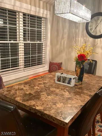 a view of a kitchen with a sink and dishwasher