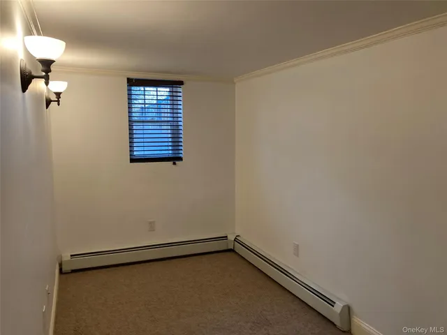 a view of a room with a window