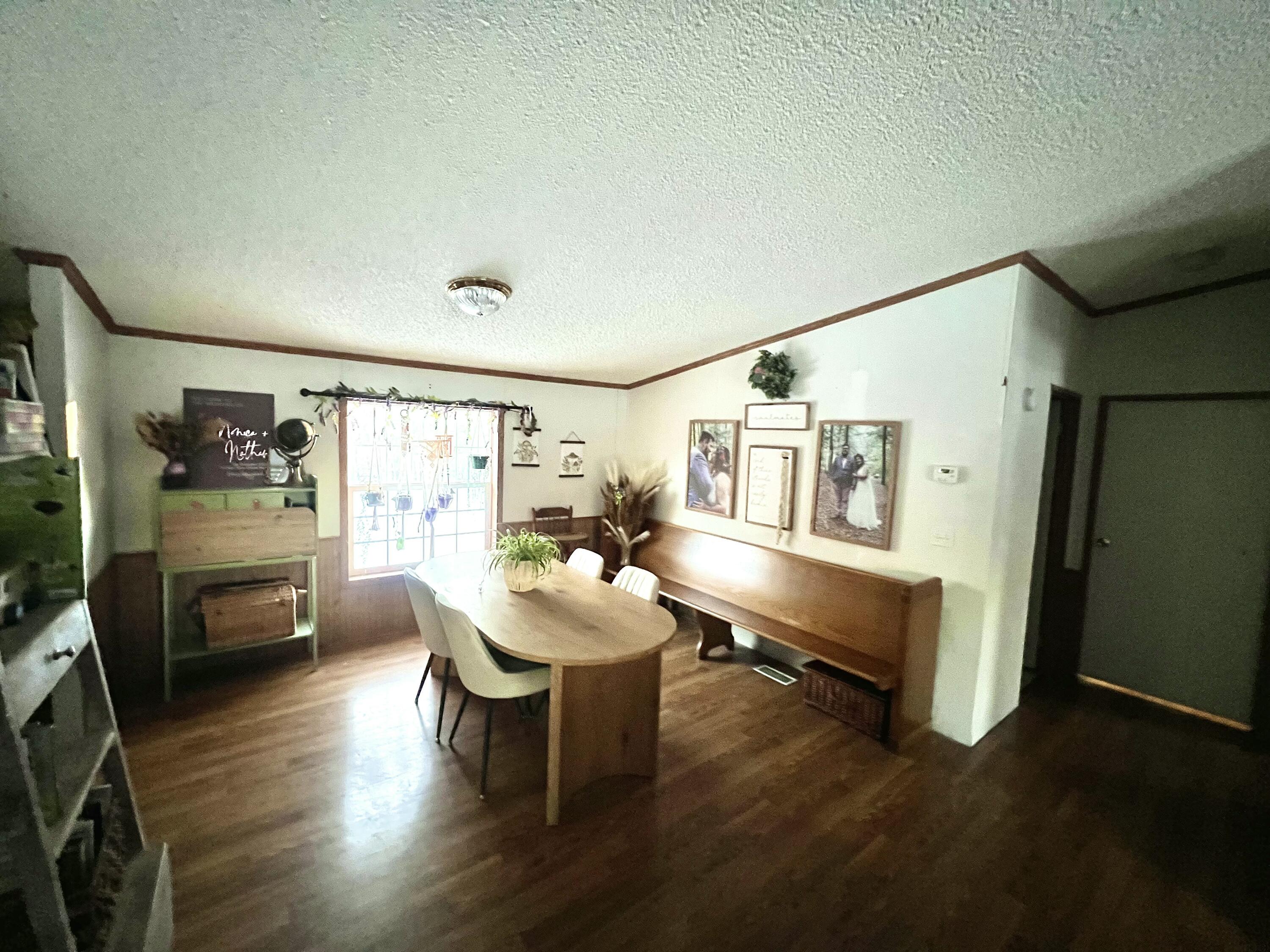 3665 Leslie Street North Judson, IN 46366 - Photo 20 of 39 a living room with furniture and a wooden floor