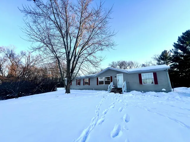 a view of a house with a snow in snow