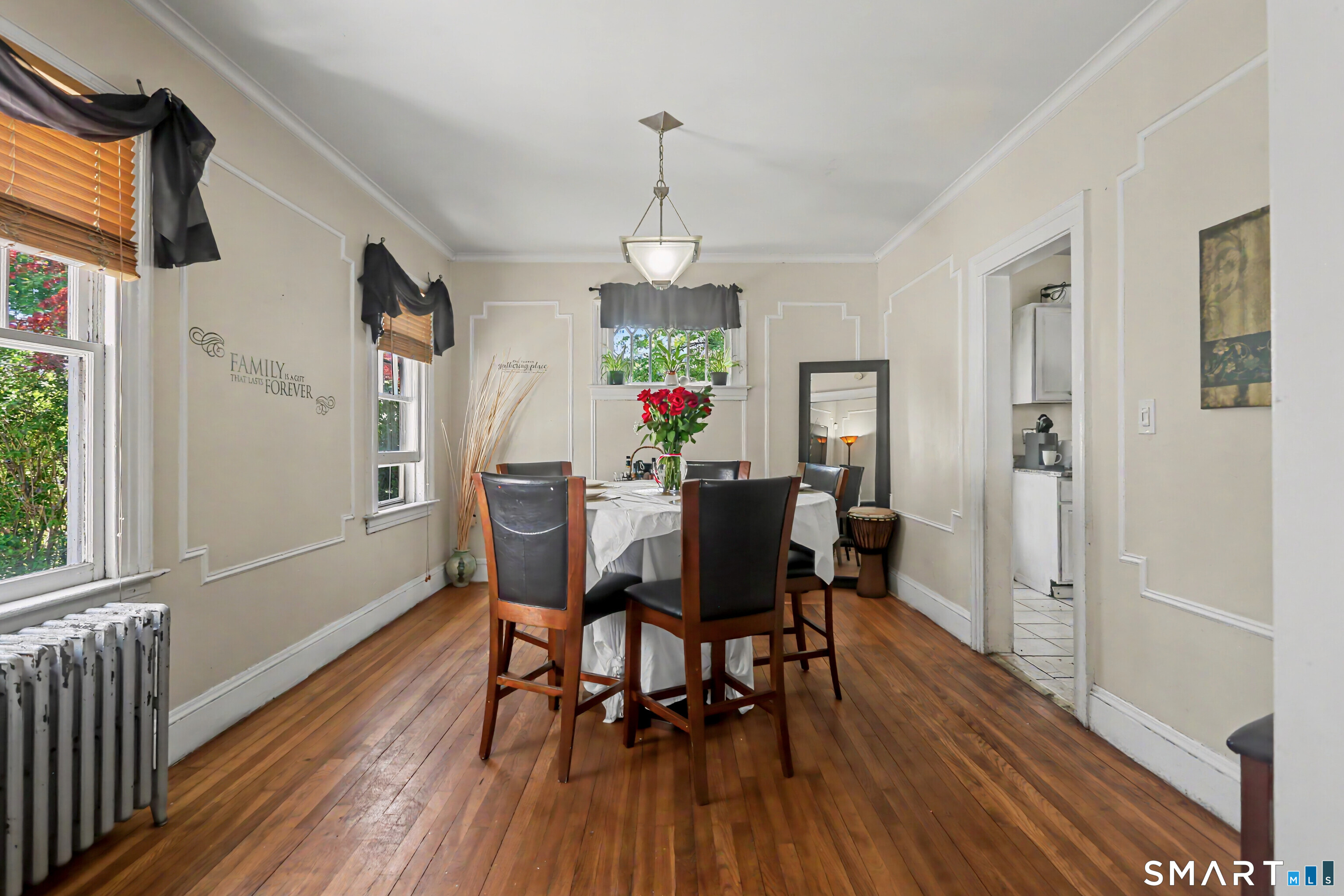 94 2nd Street Hamden, CT 06514 - Photo 8 of 31 a view of a dining room with furniture window and wooden floor