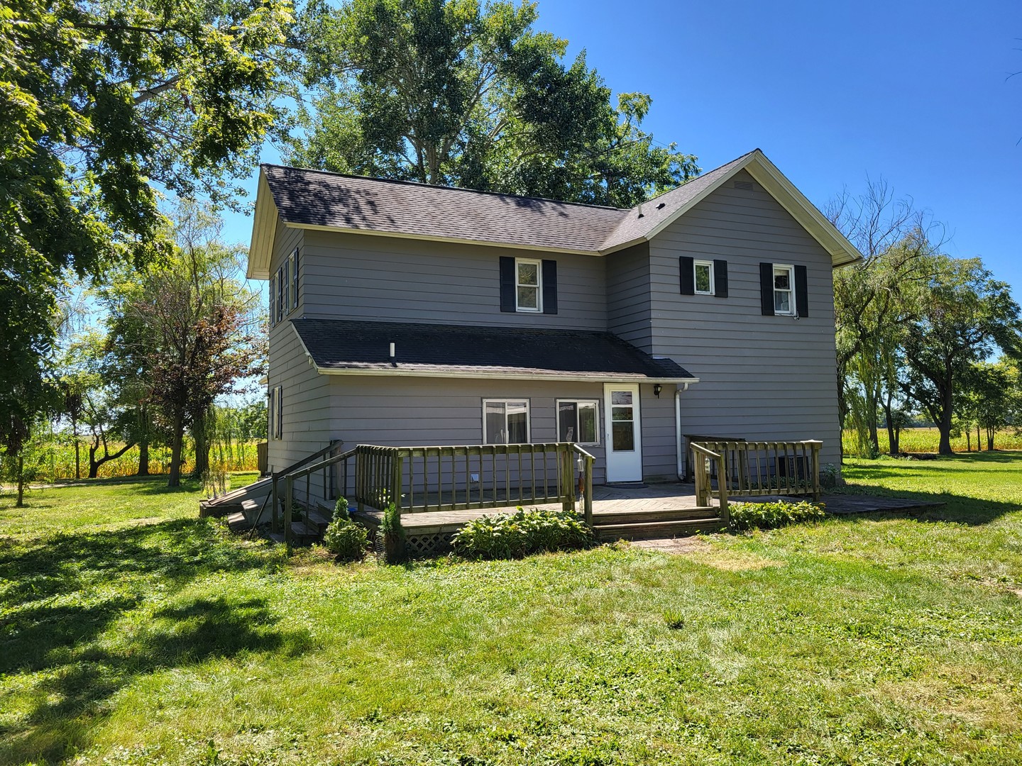 1426 Paw Paw Road Lee, IL 60530 - Photo 4 of 24 front view of a house with a yard