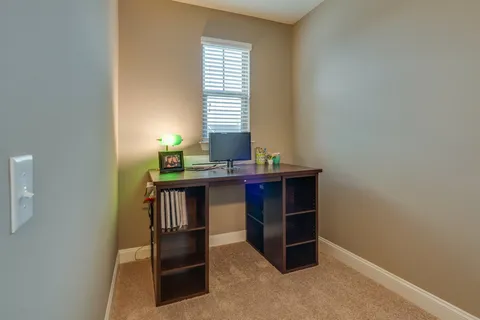 a room with a window and a table