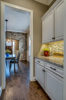 a view of kitchen with breakfast area