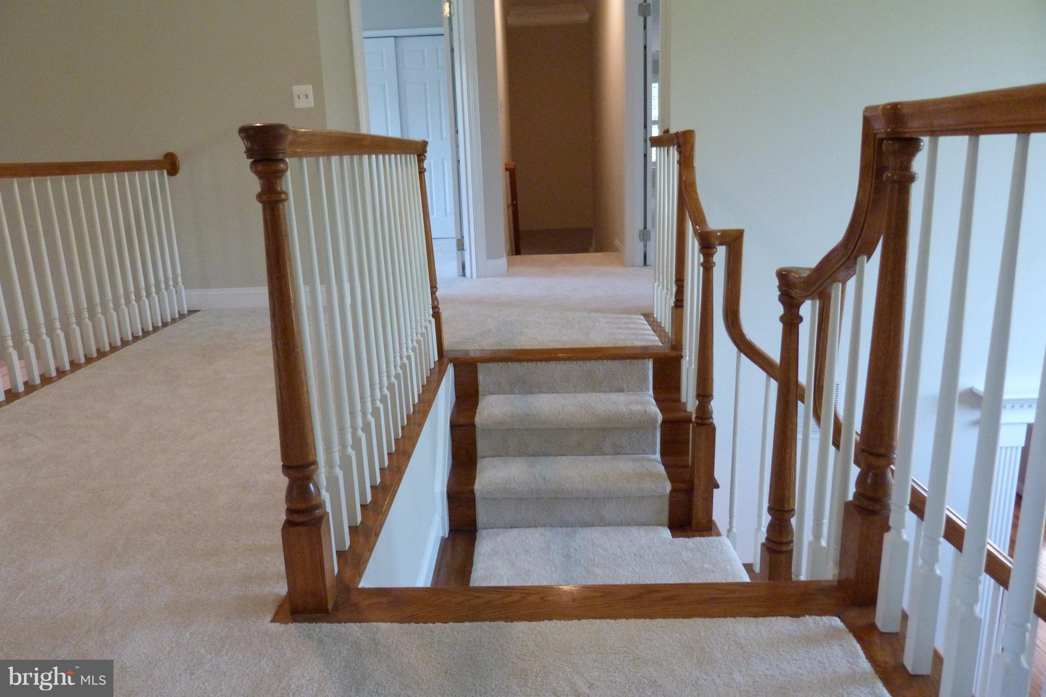 1716 Raleigh Hill Road Vienna, VA 22182 - Photo 22 of 30 Upstairs Hallway-Front Stairs with Split Landing