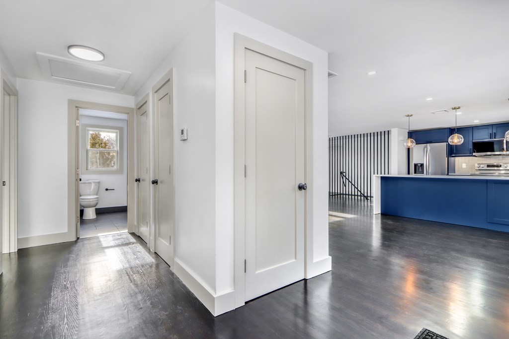11 Spring Lane Saugus, MA 01906 - Photo 12 of 31 a view of a kitchen and wooden floor