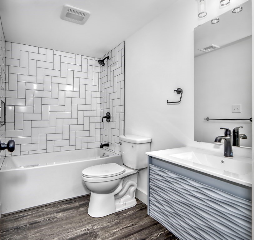 11 Spring Lane Saugus, MA 01906 - Photo 24 of 31 a bathroom with a sink toilet and shower