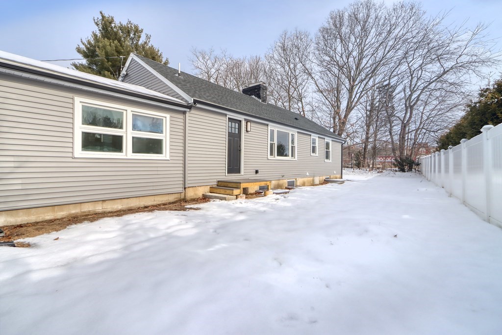 11 Spring Lane Saugus, MA 01906 - Photo 28 of 31 a view of a house with snow on the road