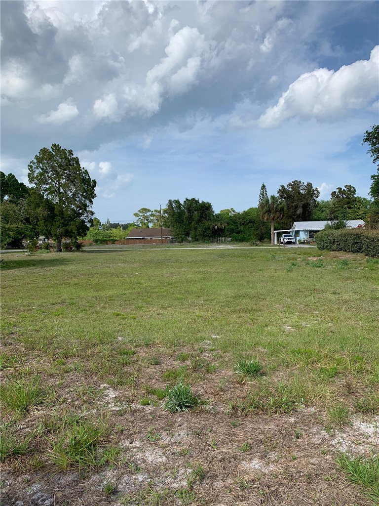 8065 126th Street Sebastian, FL 32958 - Photo 4 of 25 a view of a lake with houses in the back
