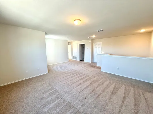 a view of a livingroom with a ceiling fan