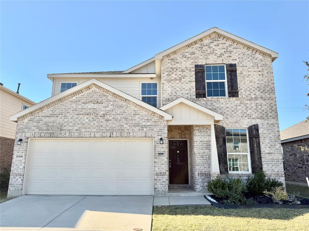 2006 Hummingbird Street Princeton, TX 75407 - Photo 2 of 23 a front view of a house with plants
