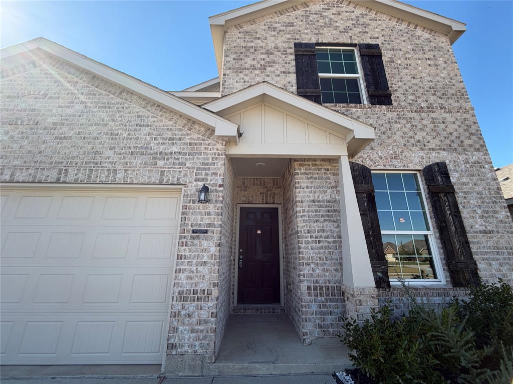 2006 Hummingbird Street Princeton, TX 75407 - Photo 3 of 23 a front view of a house