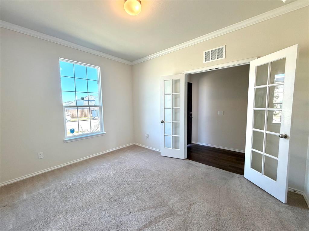 2006 Hummingbird Street Princeton, TX 75407 - Photo 9 of 23 a view of an empty room with a window