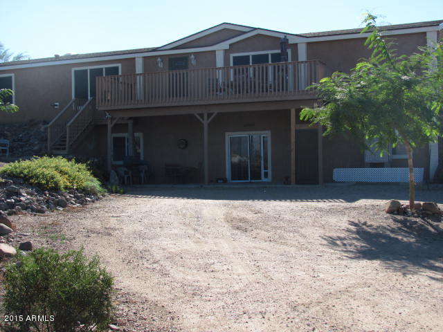 1829 West Irvine Road Phoenix, AZ 85086 - Photo 15 of 33 a front view of a house with a yard and garage