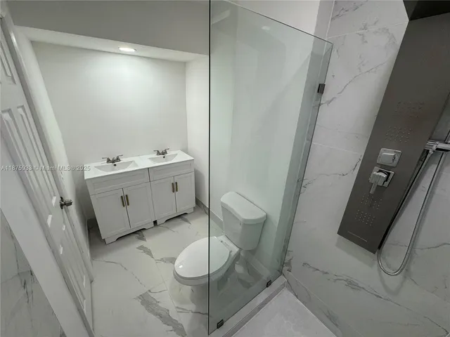 a view of balcony and wooden floor