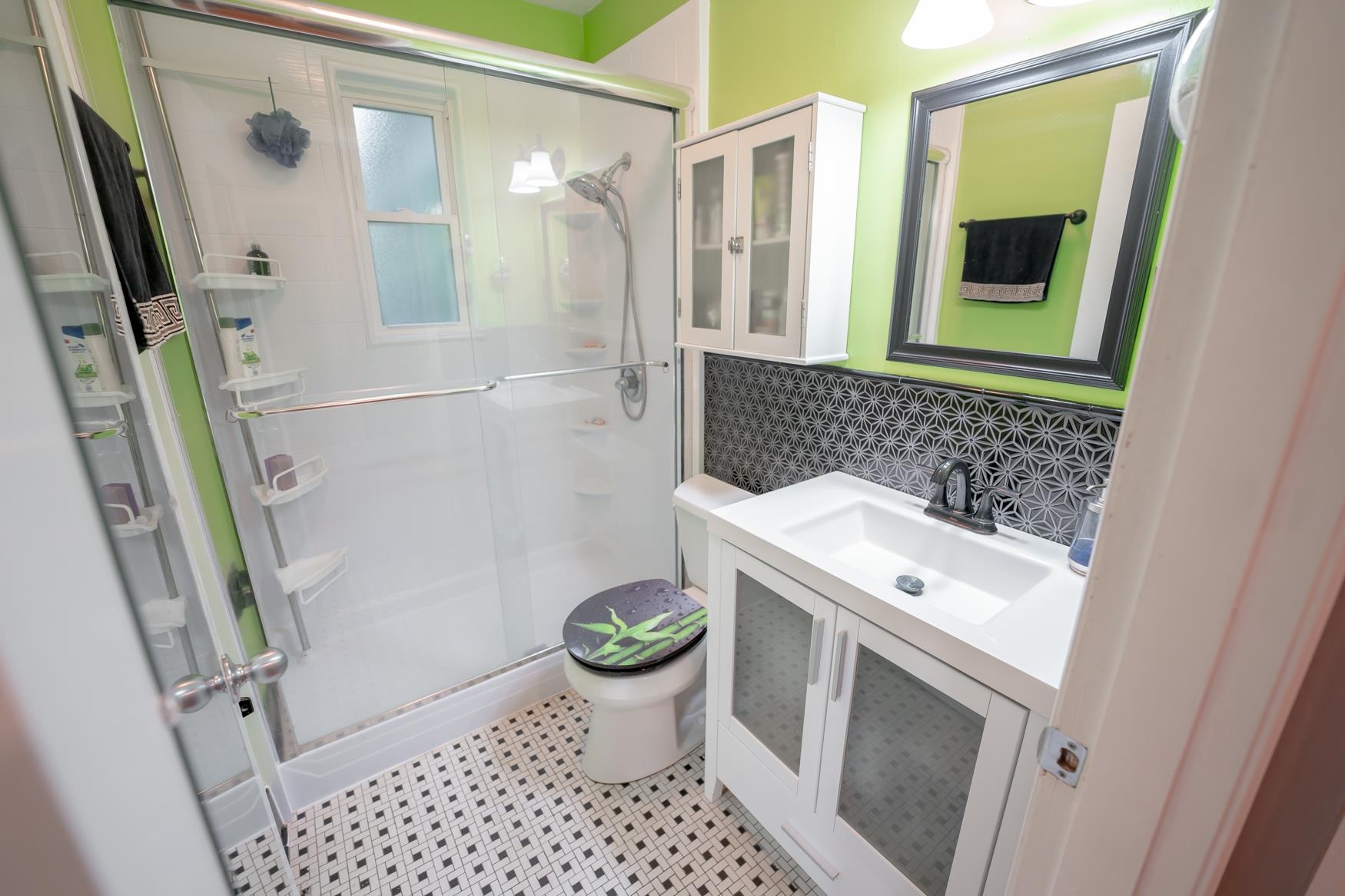 1033 Colonial Road Memphis, TN 38117 - Photo 23 of 25 a bathroom with a sink and toilet