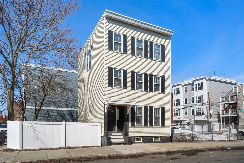 110 D Street Boston, MA 02127 - Photo 28 of 33 a front view of a building with a street
