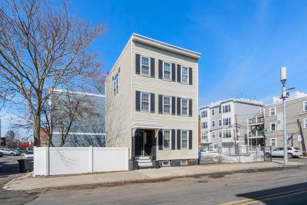 110 D Street Boston, MA 02127 - Photo 29 of 33 a front view of a building with a street view