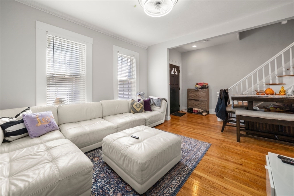 110 D Street Boston, MA 02127 - Photo 10 of 33 a living room with furniture and a window