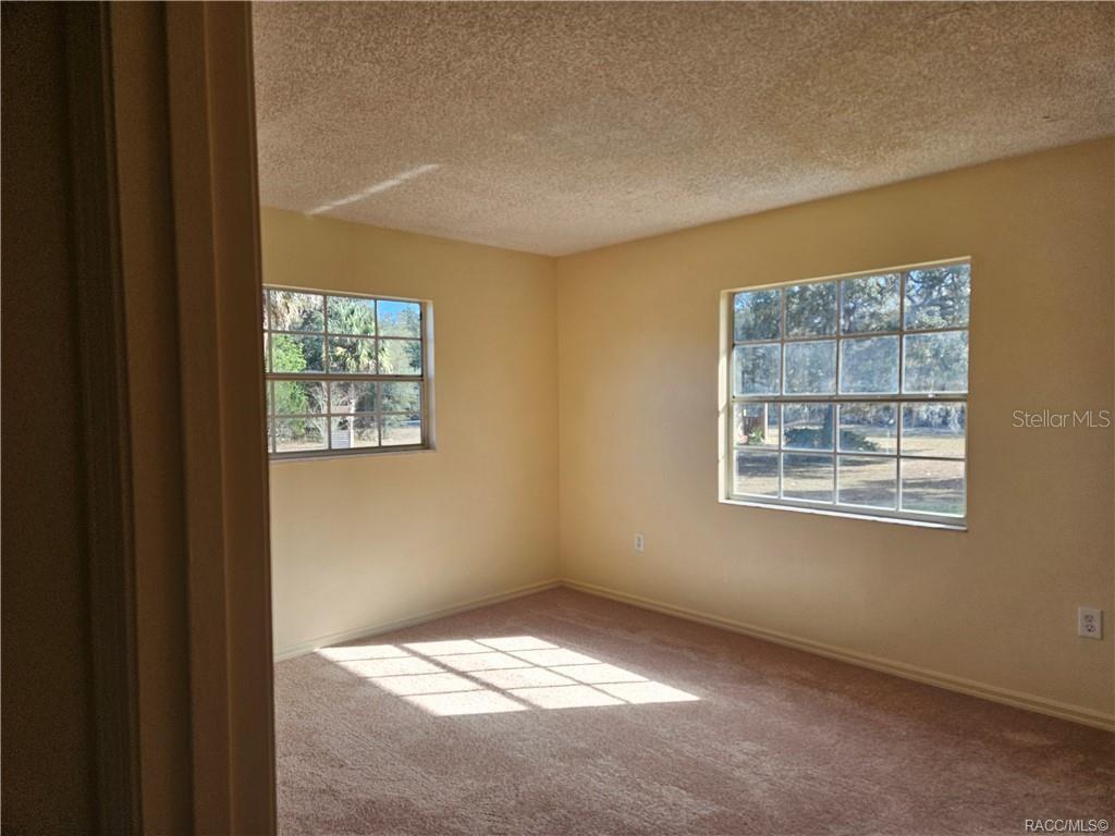 7370 West 7 Rivers Drive Crystal River, FL 34429 - Photo 11 of 22 a view of an empty room with a window