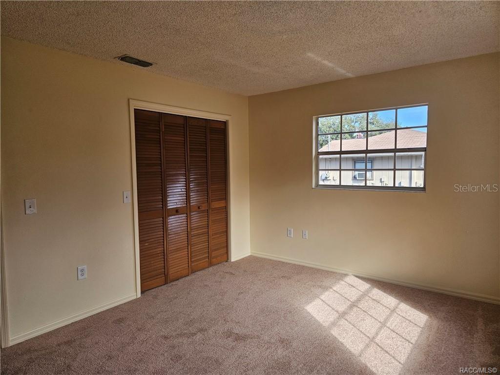 7370 West 7 Rivers Drive Crystal River, FL 34429 - Photo 12 of 22 an empty room with windows