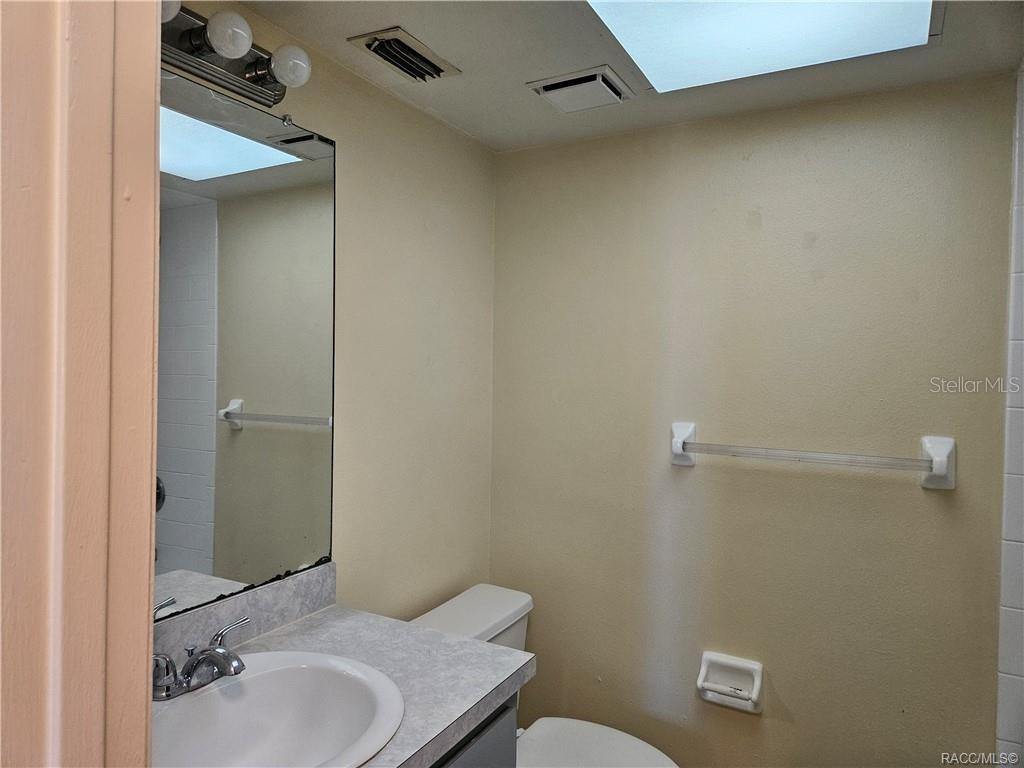 7370 West 7 Rivers Drive Crystal River, FL 34429 - Photo 13 of 22 a bathroom with a sink and toilet