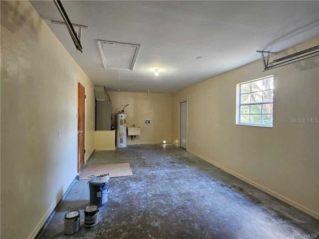 7370 West 7 Rivers Drive Crystal River, FL 34429 - Photo 17 of 22 a view of a livingroom with a dishwasher and furniture