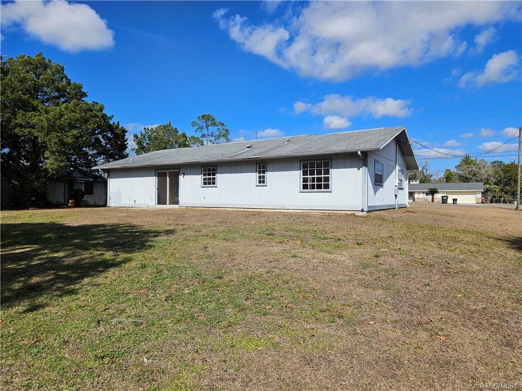 7370 West 7 Rivers Drive Crystal River, FL 34429 - Photo 21 of 22 a view of a house with a yard
