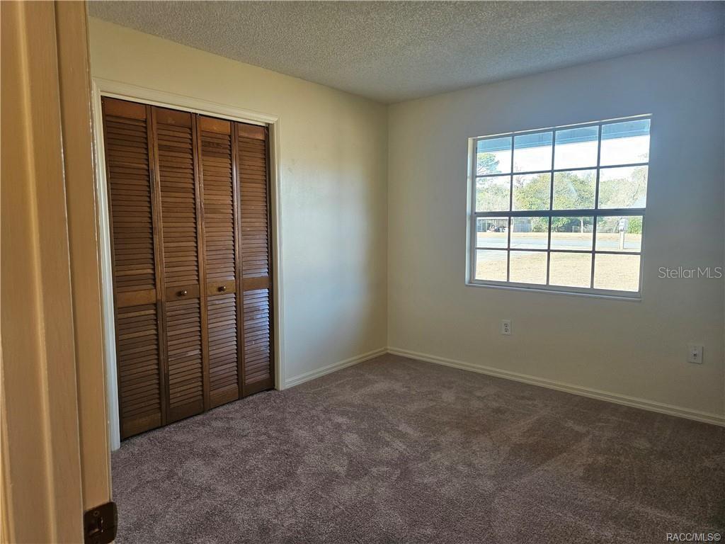 7370 West 7 Rivers Drive Crystal River, FL 34429 - Photo 6 of 22 an empty room with windows