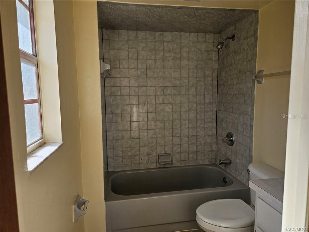 7370 West 7 Rivers Drive Crystal River, FL 34429 - Photo 7 of 22 a bathroom with a bathtub and shower