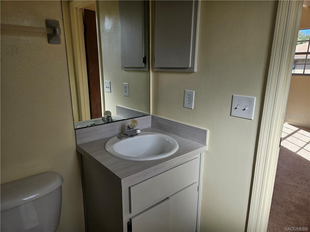 7370 West 7 Rivers Drive Crystal River, FL 34429 - Photo 8 of 22 a bathroom with a sink and a toilet