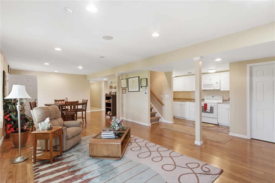 4536 Crystal Ridge Circle Gorham, NY 14424 - Photo 31 of 48 Spacious living and dining room combination featuring elegant recessed lighting.