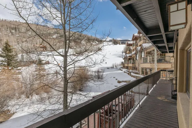 a view of balcony and wooden floor