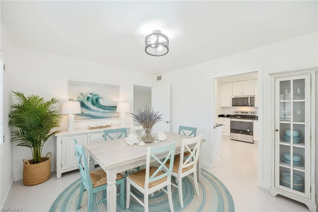 4180 Crayton Road, Unit E4 Naples, FL 34103 - Photo 10 of 25 Dining Area Staged