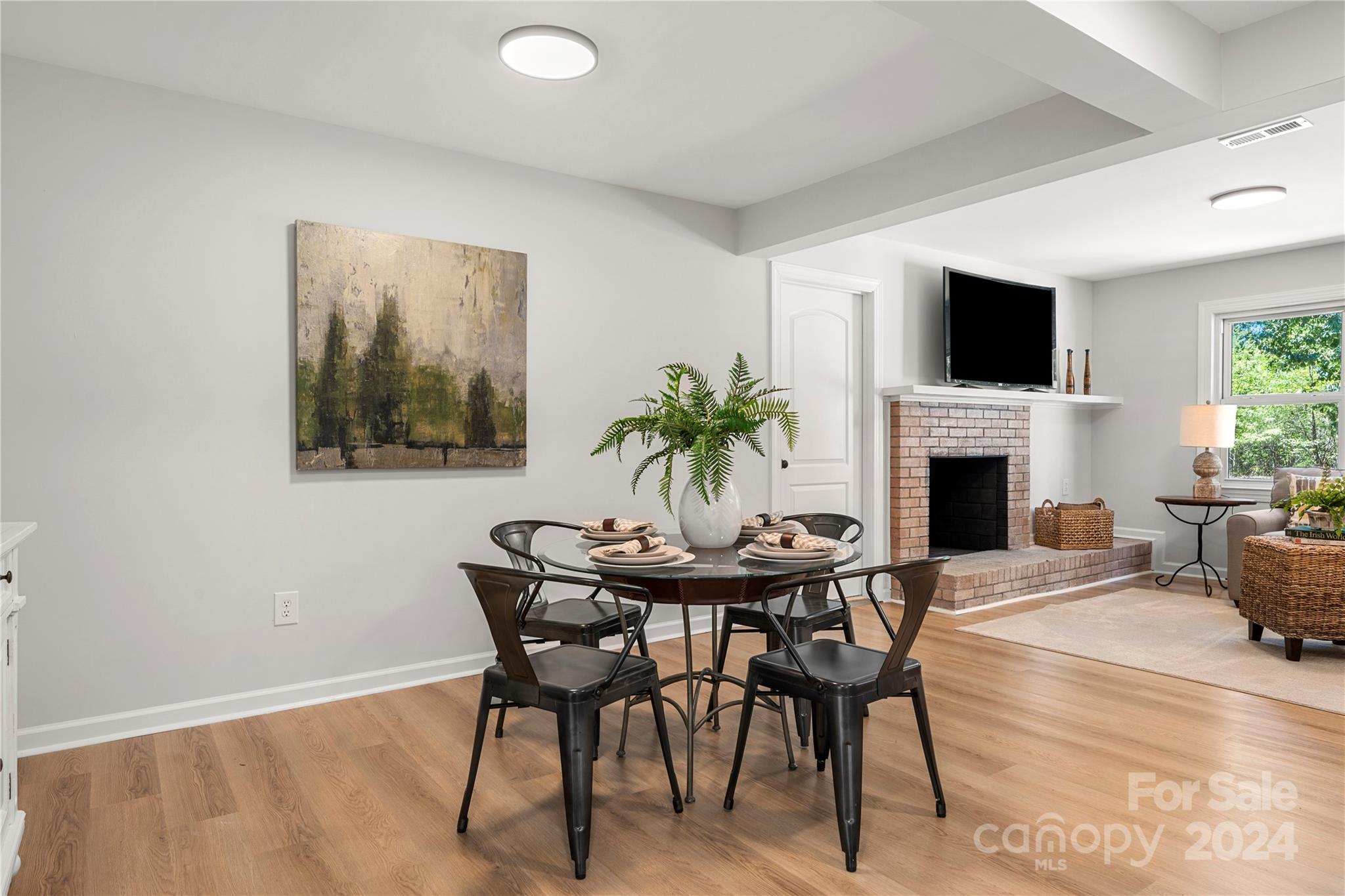 914 Margrace Road Kings Mountain, NC 28086 - Photo 14 of 36 a living room with furniture a flat screen tv and a fireplace