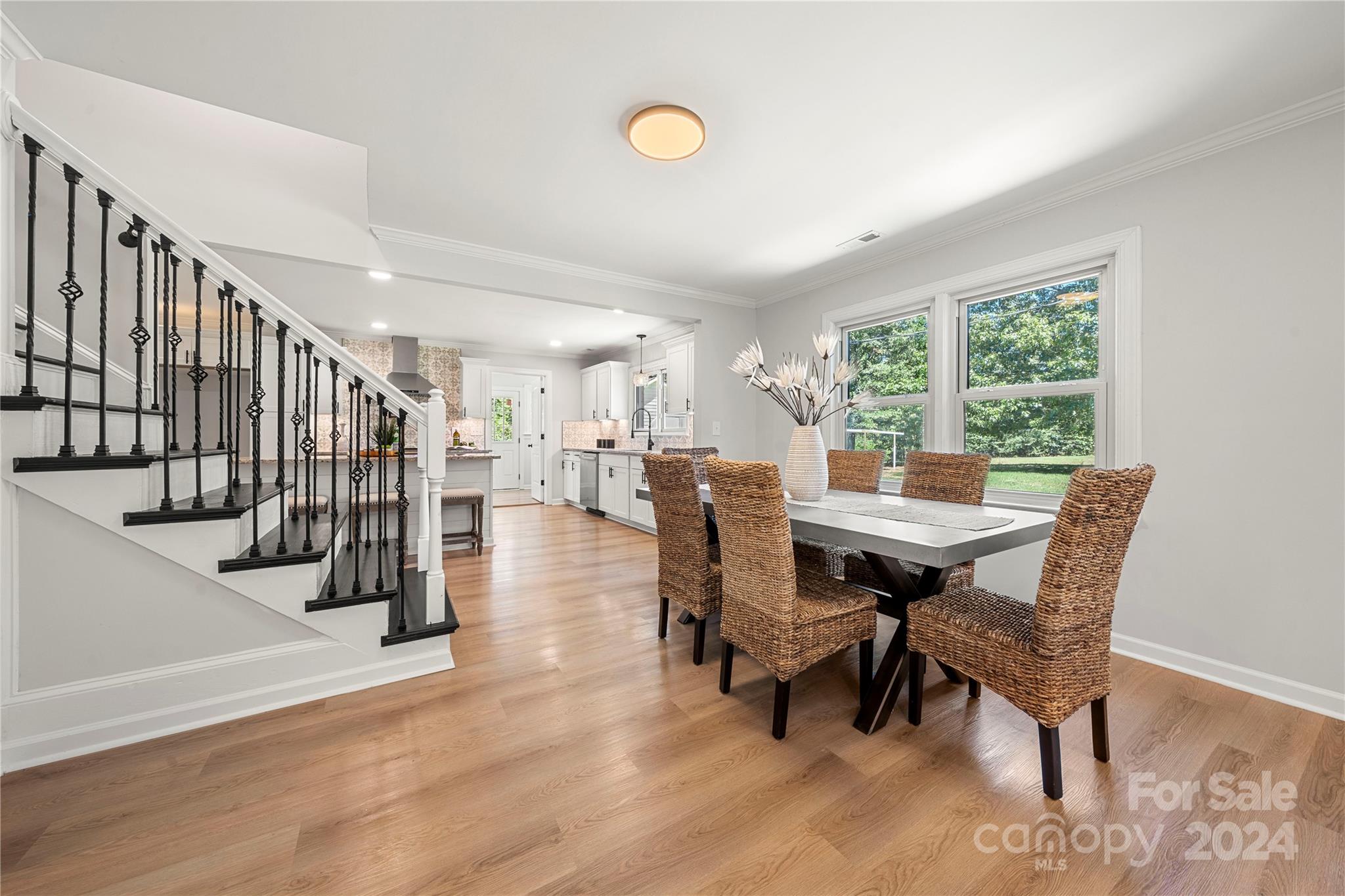 914 Margrace Road Kings Mountain, NC 28086 - Photo 16 of 36 a view of a dining room with furniture window and wooden floor