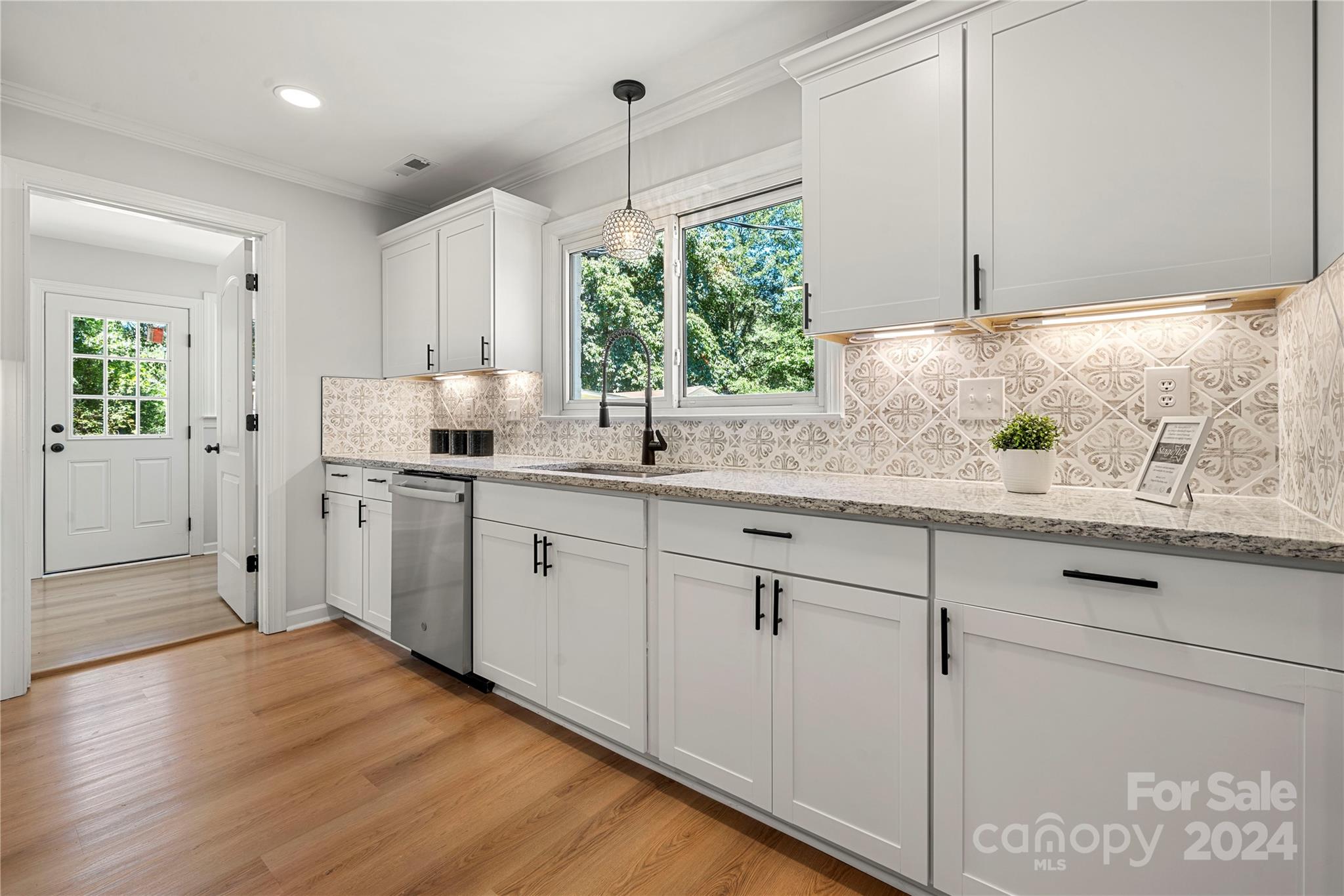 914 Margrace Road Kings Mountain, NC 28086 - Photo 17 of 36 a kitchen with a sink cabinets appliances and windows