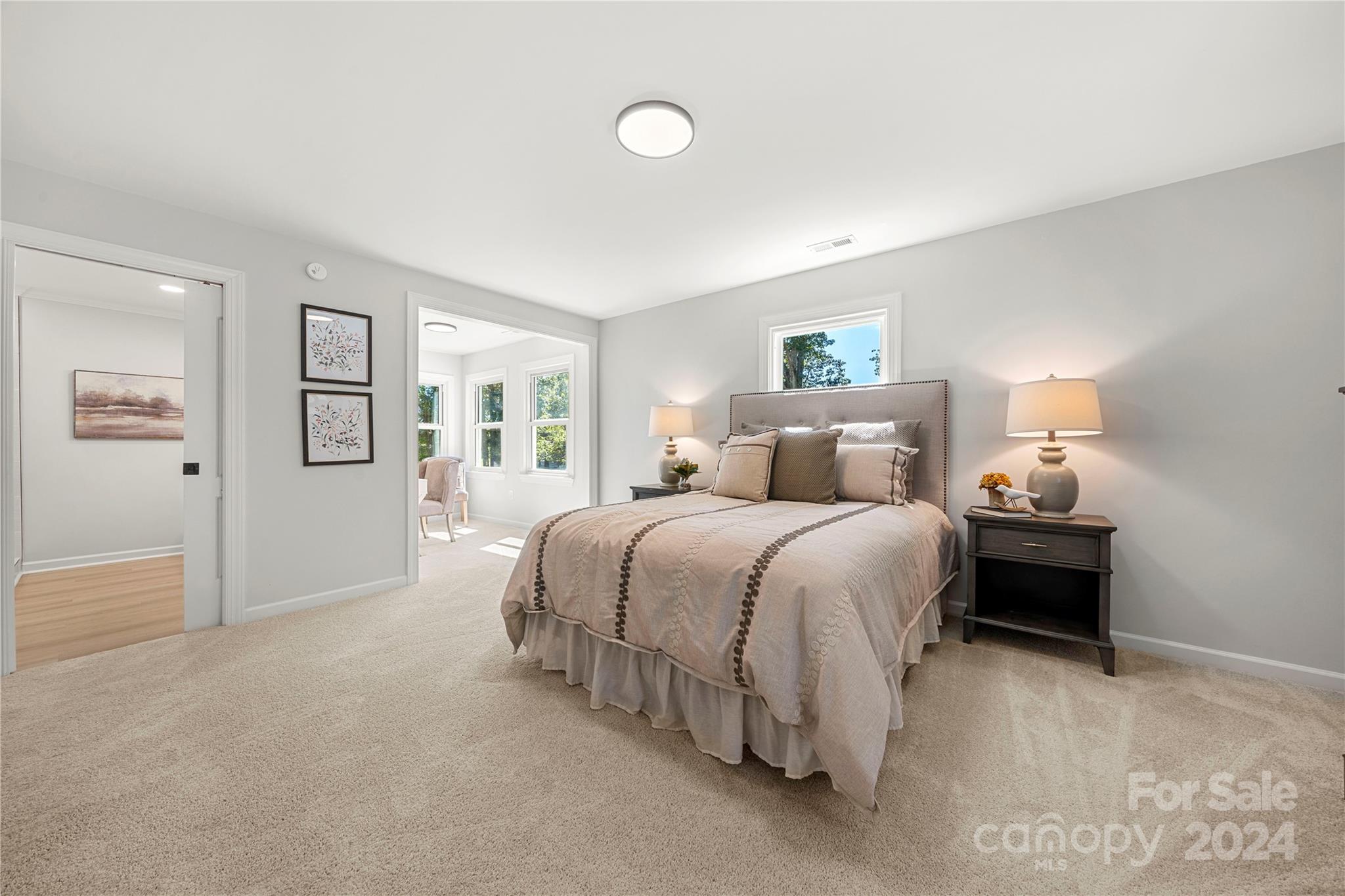 914 Margrace Road Kings Mountain, NC 28086 - Photo 20 of 36 a bedroom with a bed and wooden floor