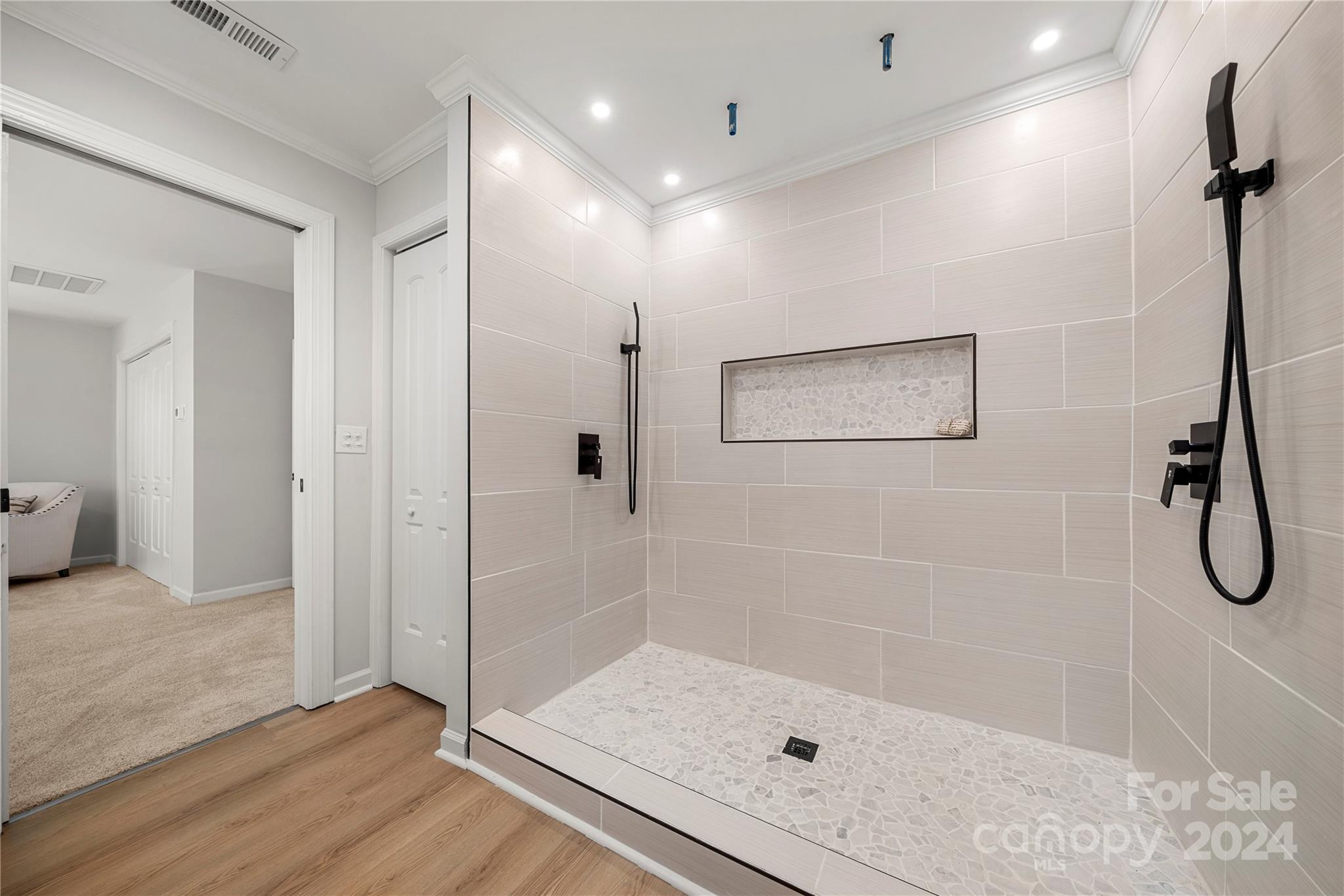 914 Margrace Road Kings Mountain, NC 28086 - Photo 23 of 36 a bathroom with a glass shower door