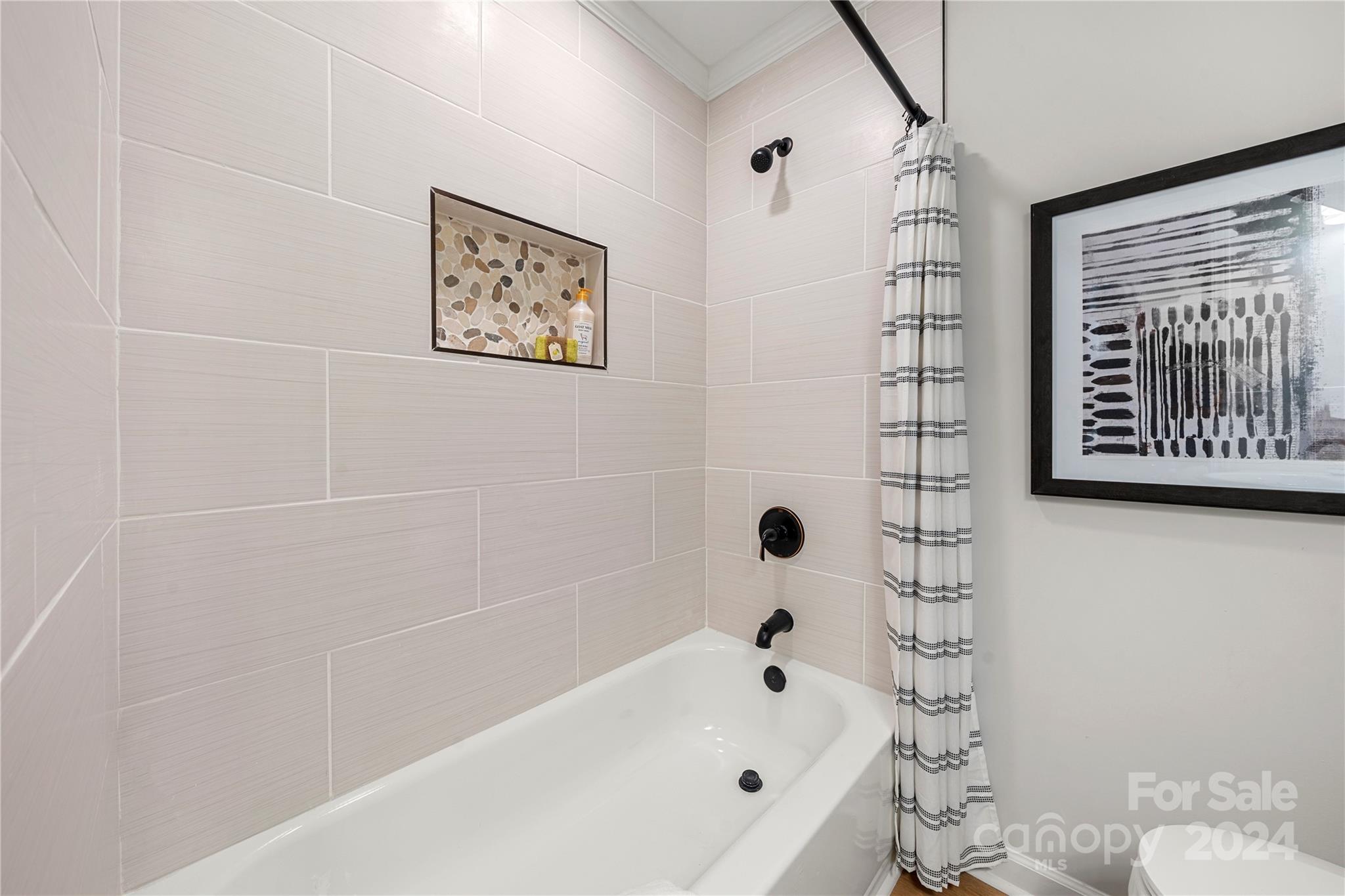 914 Margrace Road Kings Mountain, NC 28086 - Photo 25 of 36 a bathroom with a bathtub and a shower