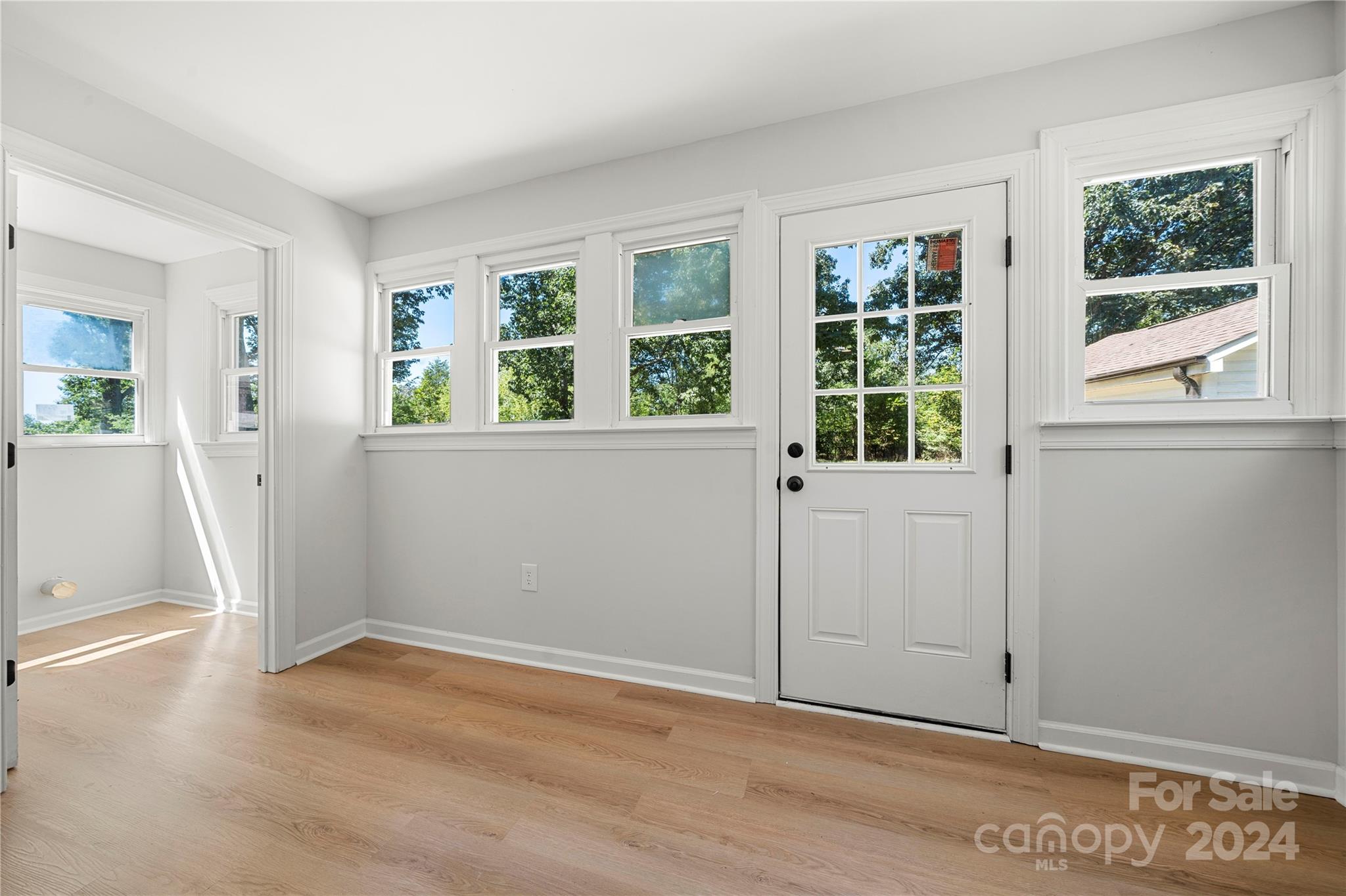 914 Margrace Road Kings Mountain, NC 28086 - Photo 26 of 36 an empty room with wooden floor and windows