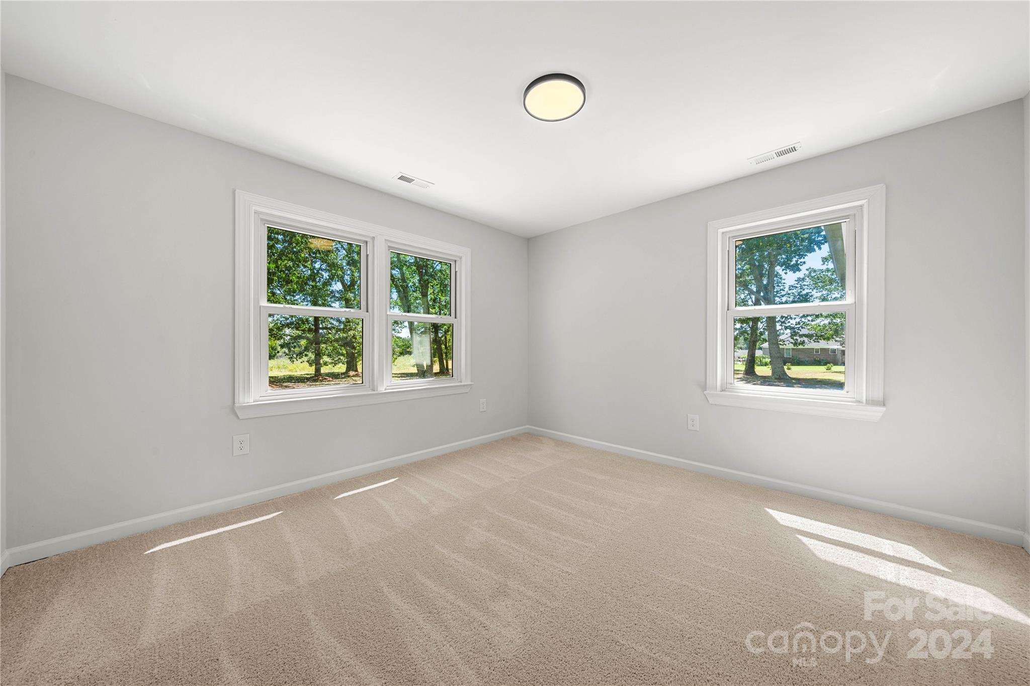 914 Margrace Road Kings Mountain, NC 28086 - Photo 28 of 36 an empty room with windows and window