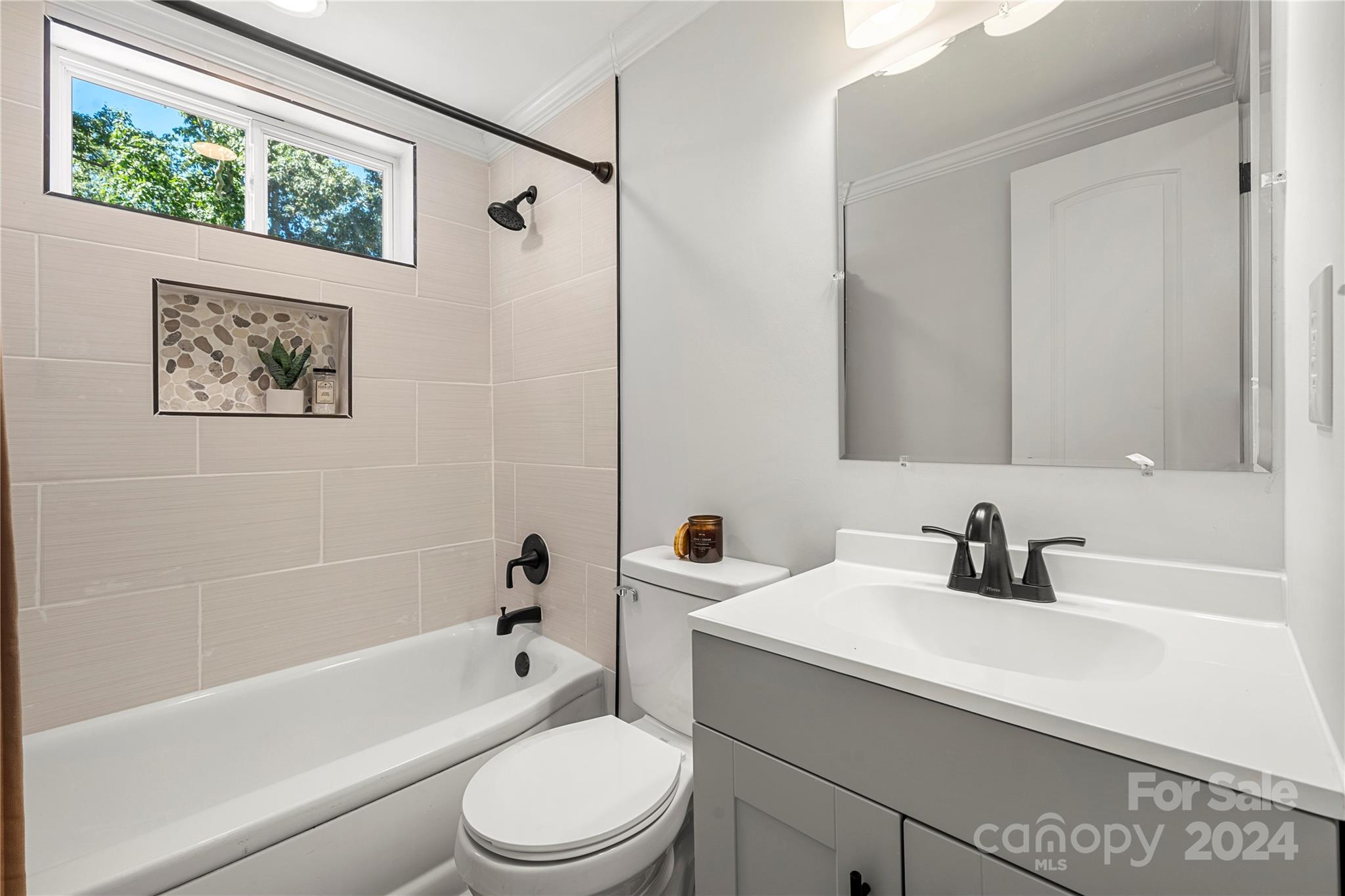 914 Margrace Road Kings Mountain, NC 28086 - Photo 30 of 36 a bathroom with a sink a toilet and a bathtub