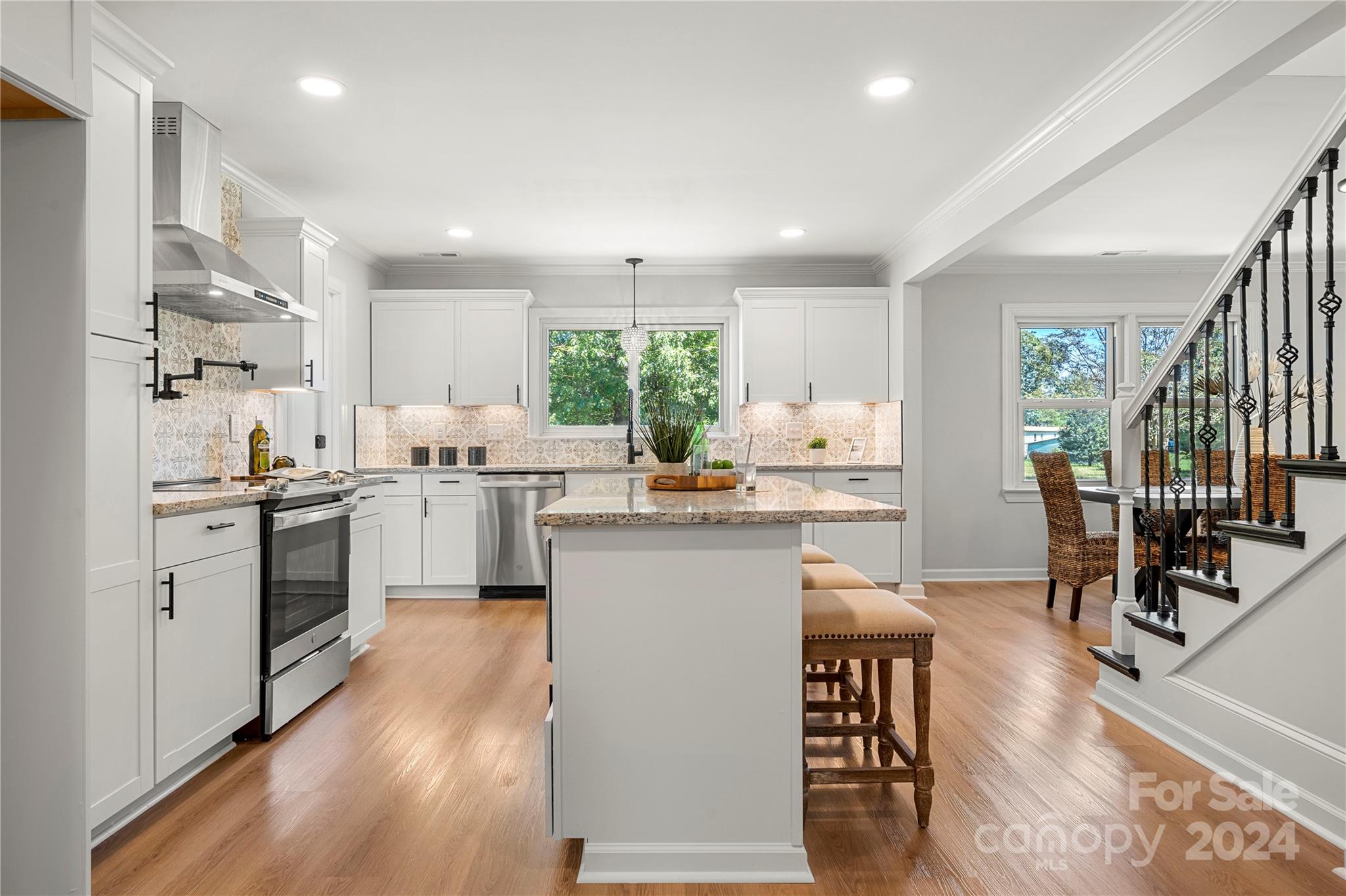 914 Margrace Road Kings Mountain, NC 28086 - Photo 4 of 36 a kitchen with white cabinets and white appliances